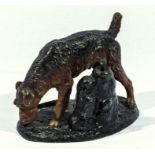 A cold painted bronze terrier cigarette lighter, 12cm tall x 16cm long