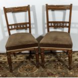 A pair of late Victorian chairs.