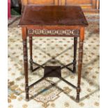 A late Victorian window table with fret work sides.