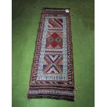 A hand woven wool Persian Kilim runner 50cm x 156cm