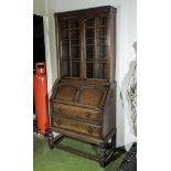A vintage oak bureau bookcase.