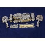 An Art Nouveau silver dressing table set