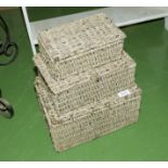 Three wicker baskets, small one containing bijouterie