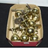 A box containing brass door knobs