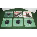 Six Beatles singles, first pressings.