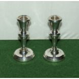 A pair of silver dwarf candle sticks Birmingham 1956 marked ALD