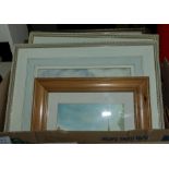 A box of framed prints and watercolours