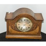 An inlaid mantle clock