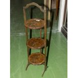 A walnut folding cake stand