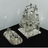 A silver plated four piece cruet and a small cruet