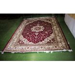 A red ground Keshan rug 1.90m x 1.40m