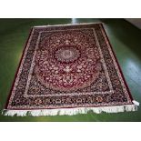 A red ground Keshan carpet 2.80m x 2.00m