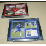 Four framed football prints