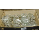 A quantity of glass candle holders