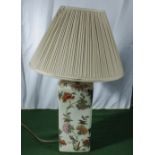 A pottery table lamp base and shade