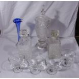 A lidded glass jar, two decanters, four sundae dishes and a vase
