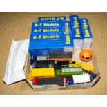 A box containing Base Toys Ltd diecast models and others