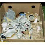 A box of assorted pottery items