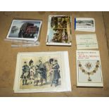 A collection of postcards, and other items