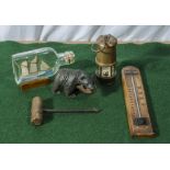 A ship in a bottle, a miners lamp and other items