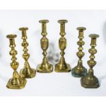 Three pairs of brass candlesticks