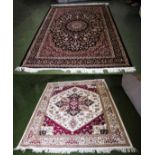 A blue ground Keshan carpet 2.30m x 1.60m and a beige ground Heriz carpet 2.30m x 1.60m