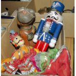 A wooden nutcracker, two puppets and other wooden figures