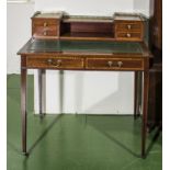An Edwardian writing desk with brass gallery, height 95cm width 91.5cm depth 50cm