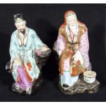 A pair of Chinese Famille Rose figures, 8.5" tall