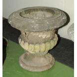 A Victorian stone garden urn 64cm high x 64cm wide