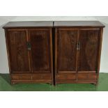 A pair of Chinese probably huanghuali or pear wood cabinets