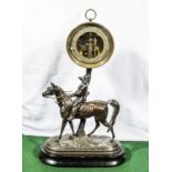 A bronze soldier on horseback barometer