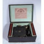 A magic lantern with slides in fitted box