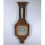 An Art Deco mahogany barometer