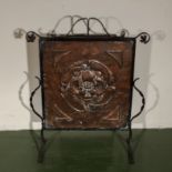 A copper Arts and Crafts fire screen