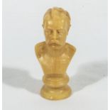 A WWI propaganda carved piece of soap in the image of Kitchener