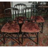 A set of four painted bedroom chairs