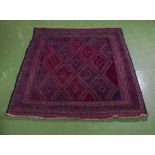 A hand woven wool tribal Gazak rug, 116cm x 124cm