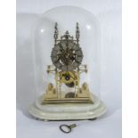 A Victorian single fusee skeleton clock, with ormolu mounted lions to sides on marble base and glass