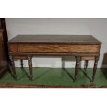 A Regency mahogany spinette case converted to a desk