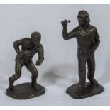 Two cold cast resin bronze figures, a rugby player and a darts player