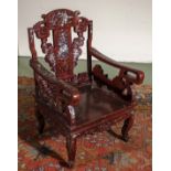 A Chinese hardwood chair inlaid with mother of pearl