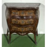 A Kingwood commode with red marble top