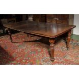 AS Victorian mahogany wind out table with two extra leaves