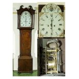 An oak cased Grandfather clock, in working order