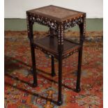 A Chinese hardwood stand with mother of pearl inlay and marble top, height 81cm top 41cm x 30cm