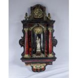 17/18th century Baroc tortoiseshell wall tabernacle with a silver Madonna and child to the niche.