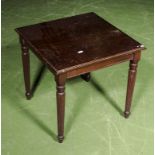 A small table with reeded legs