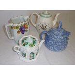 Three teapots and a jug