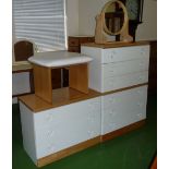 A matching set of bedroom drawers, a stool and a mirror